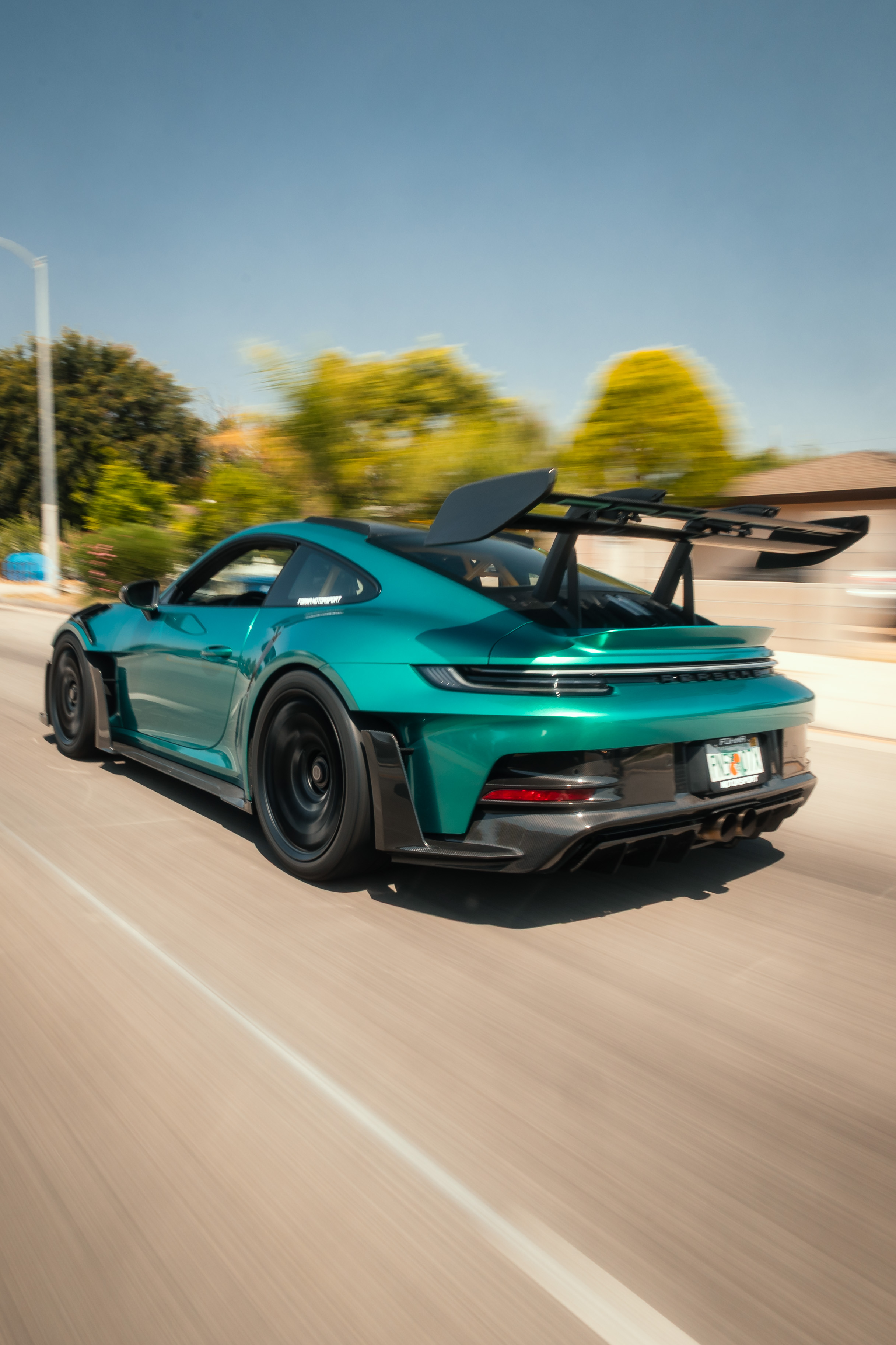 Vehicle wrap on a Porsche at Forma Motorsport